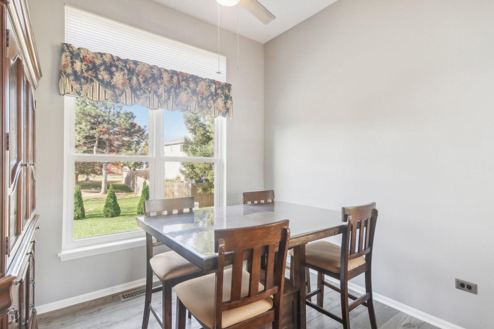 1907 Apple Valley Road Bolingbrook, IL 60490 - Photo 8 of 17 a view of a dining room with furniture window and outside view