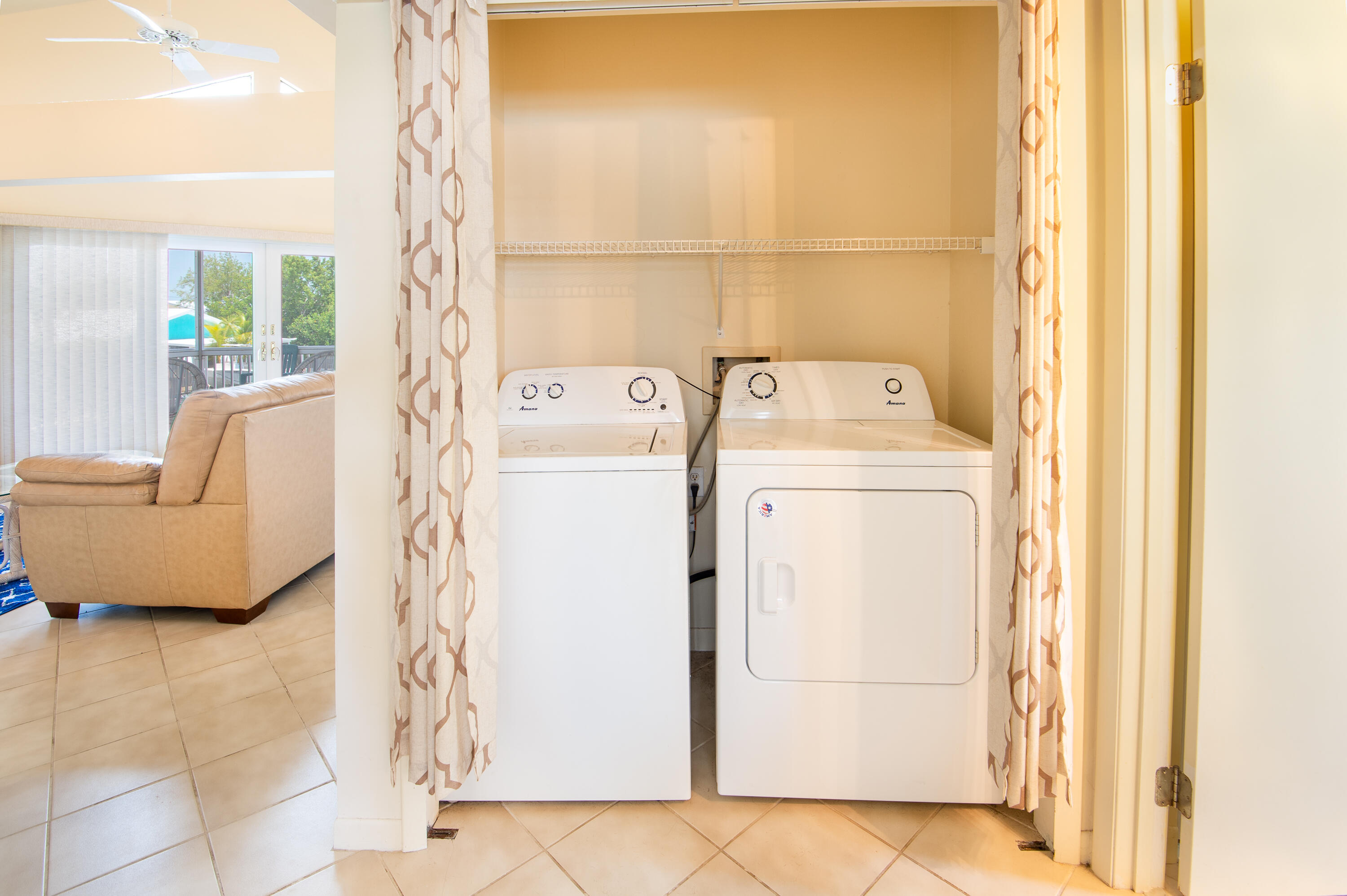 29015 Cedar Drive Big Pine Key, FL 33043 - Photo 23 of 38 a utility room with dryer and washer