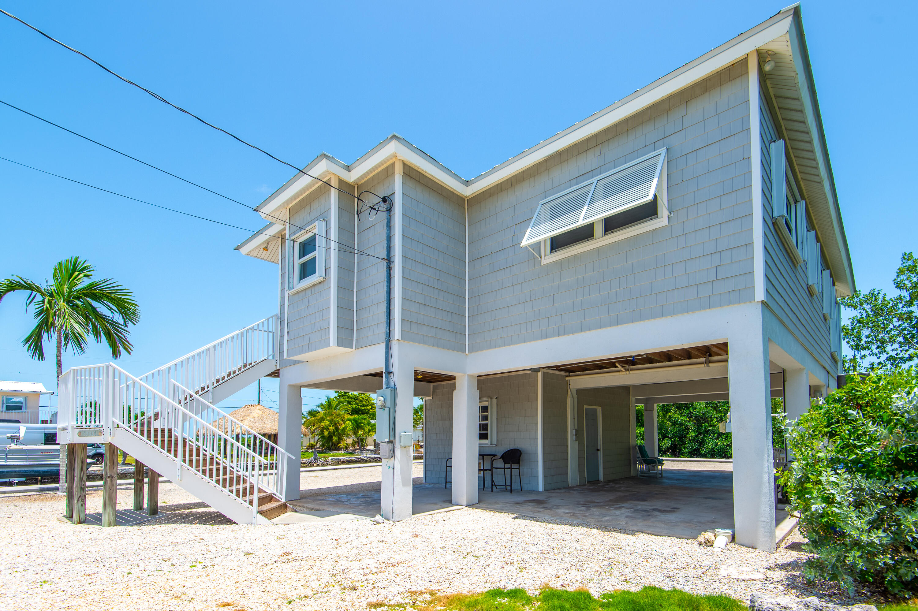 29015 Cedar Drive Big Pine Key, FL 33043 - Photo 28 of 38 a view of a house with a backyard