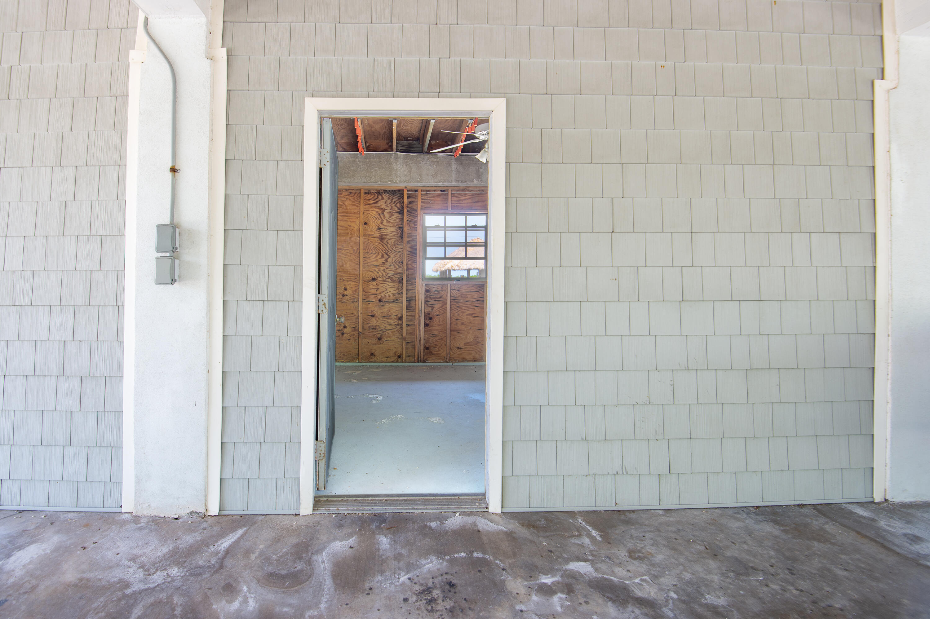 29015 Cedar Drive Big Pine Key, FL 33043 - Photo 34 of 38 a view of a wooden door