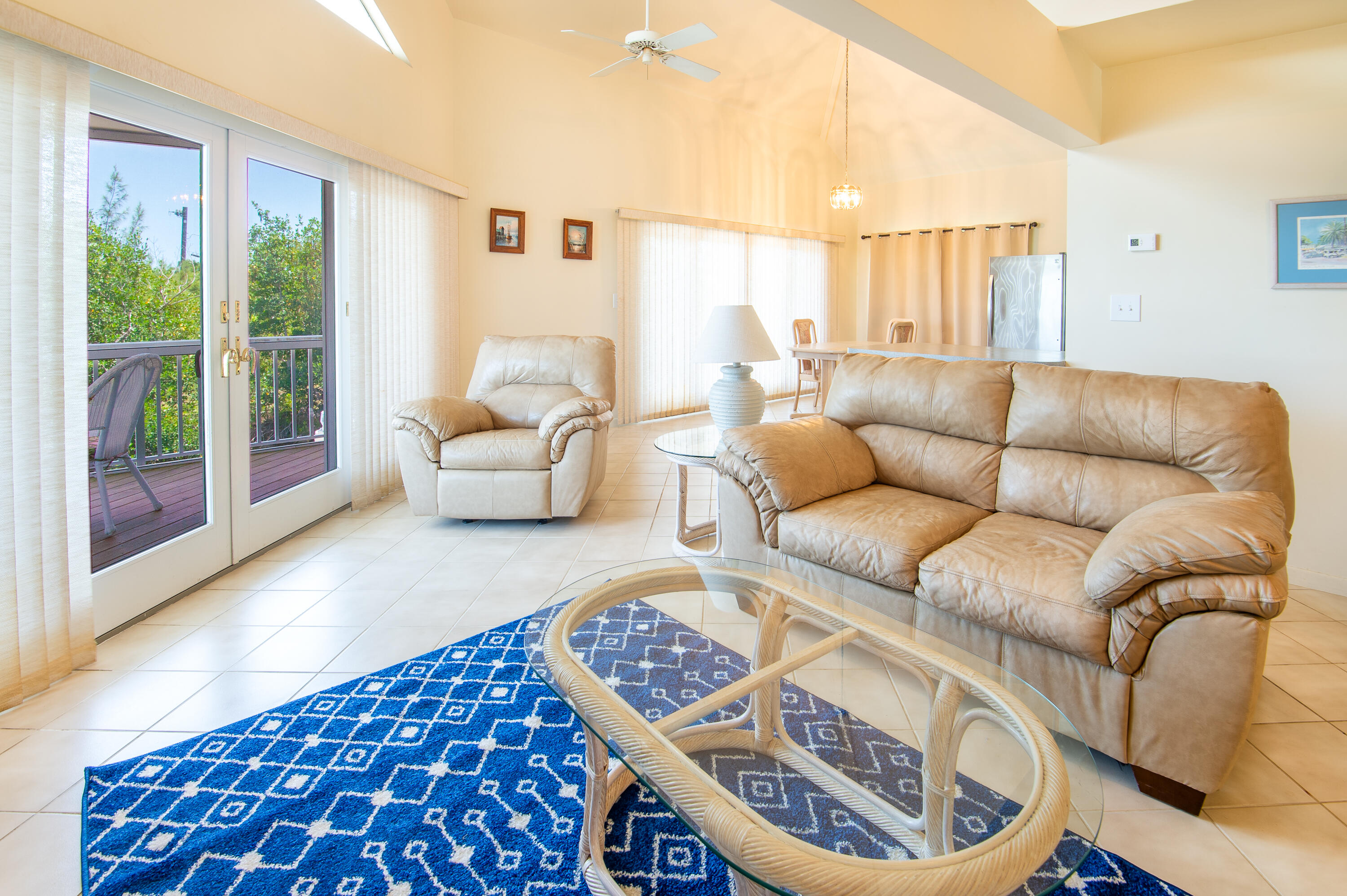 29015 Cedar Drive Big Pine Key, FL 33043 - Photo 5 of 38 a living room with furniture and a floor to ceiling window