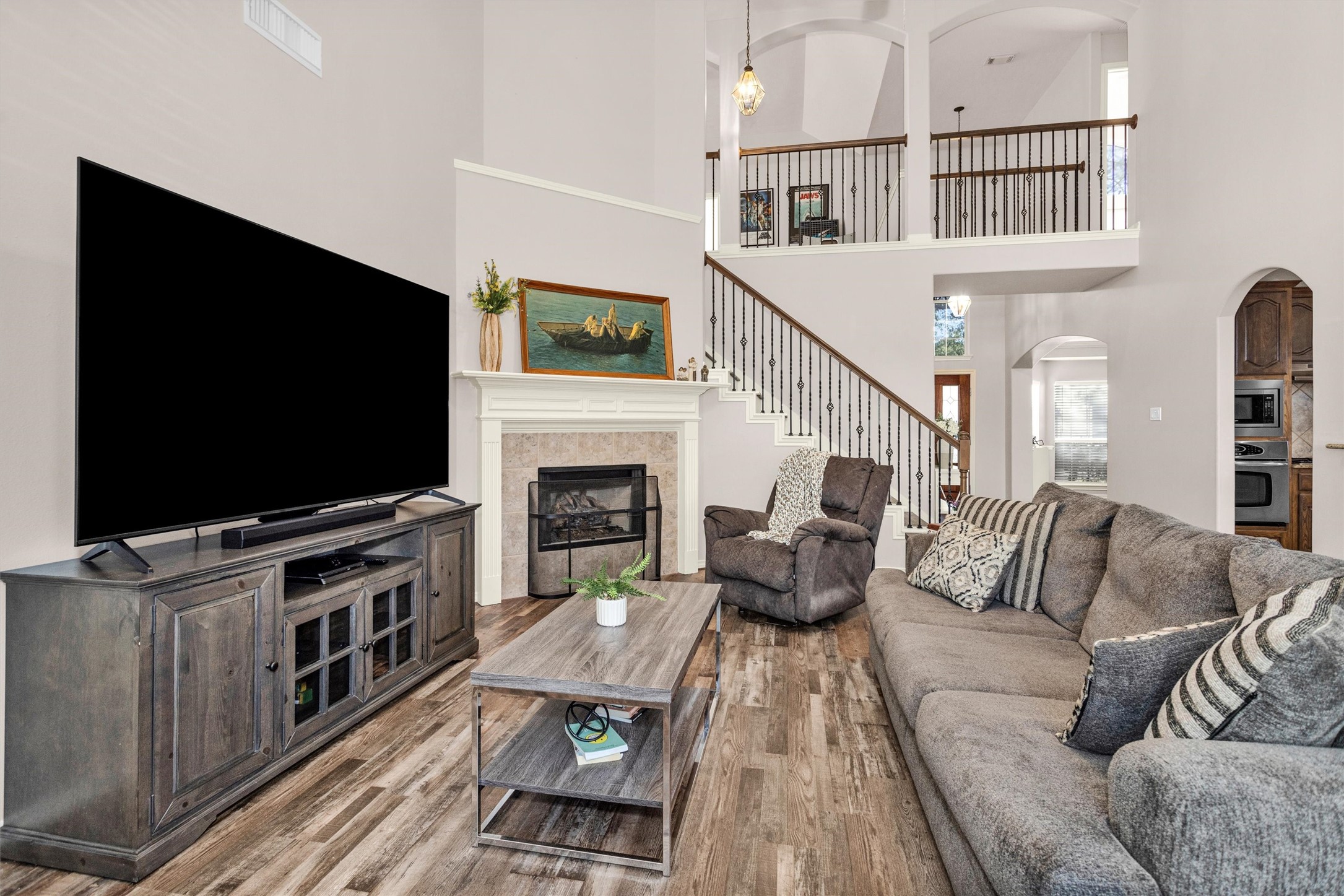 30110 Legends Ridge Drive Spring, TX 77386 - Photo 17 of 49 a living room with furniture and a flat screen tv