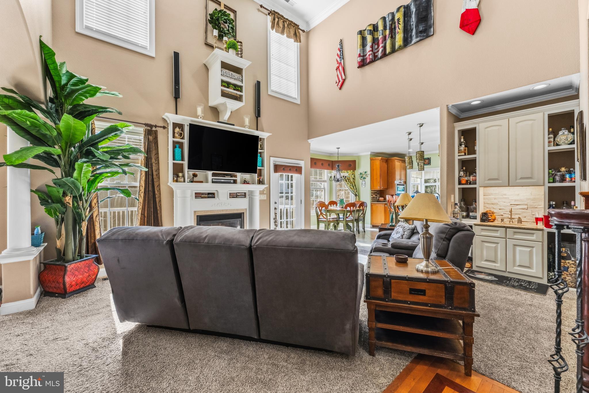 32383 Longridge Road Parsonsburg, MD 21849 - Photo 14 of 91 a living room with furniture a flat screen tv and a potted plant