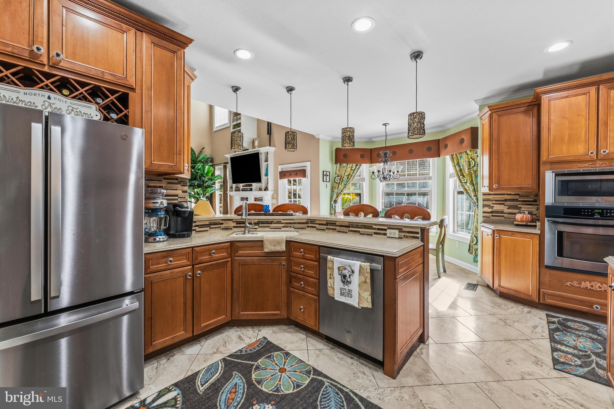 32383 Longridge Road Parsonsburg, MD 21849 - Photo 20 of 91 a kitchen with stainless steel appliances granite countertop a stove a sink a refrigerator and a refrigerator