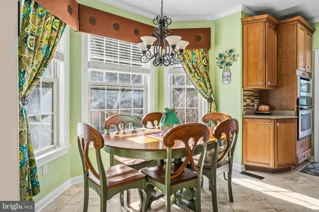 a bathroom with a tub and a shower
