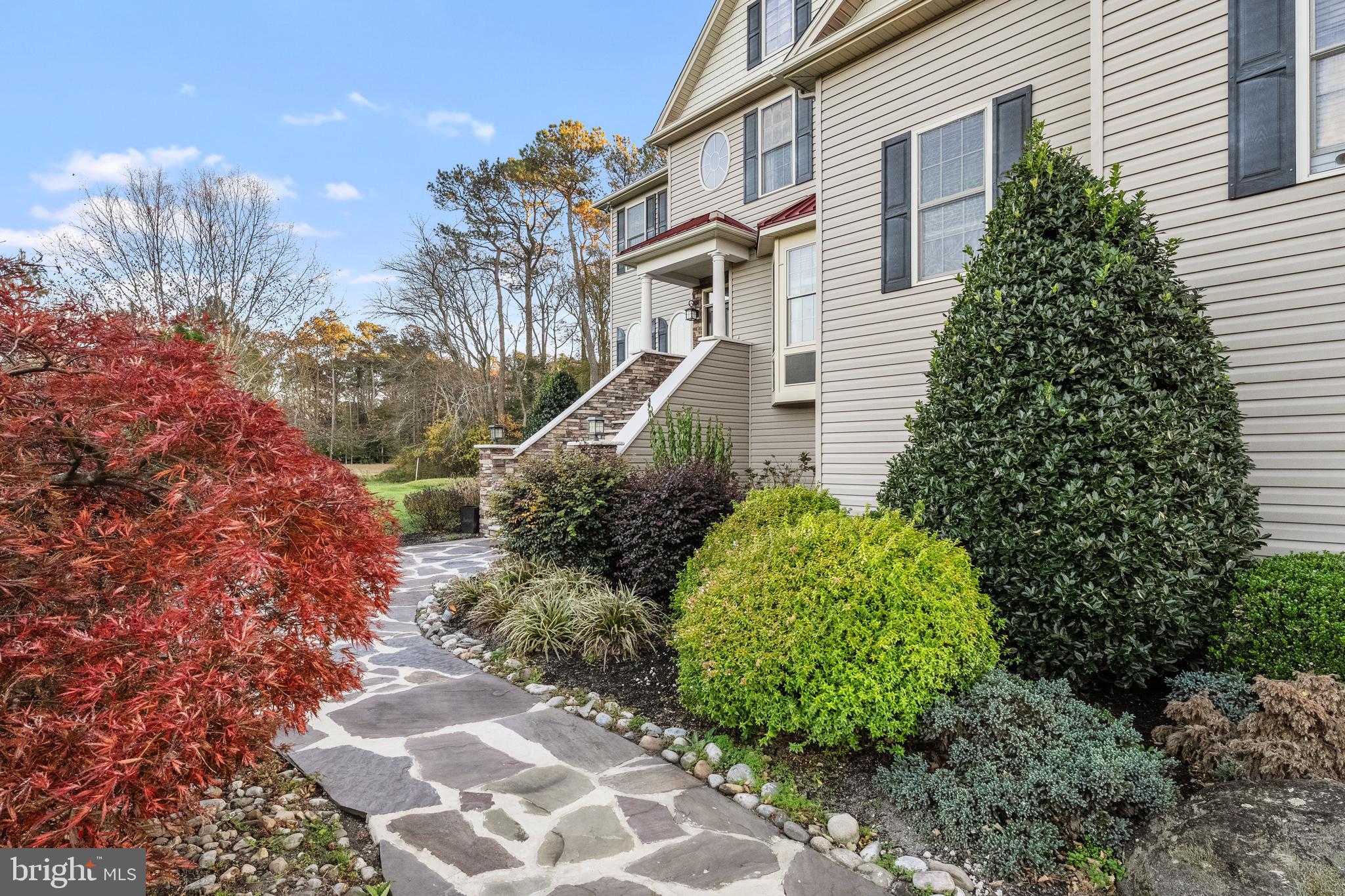 32383 Longridge Road Parsonsburg, MD 21849 - Photo 3 of 91 a front view of a house with garden