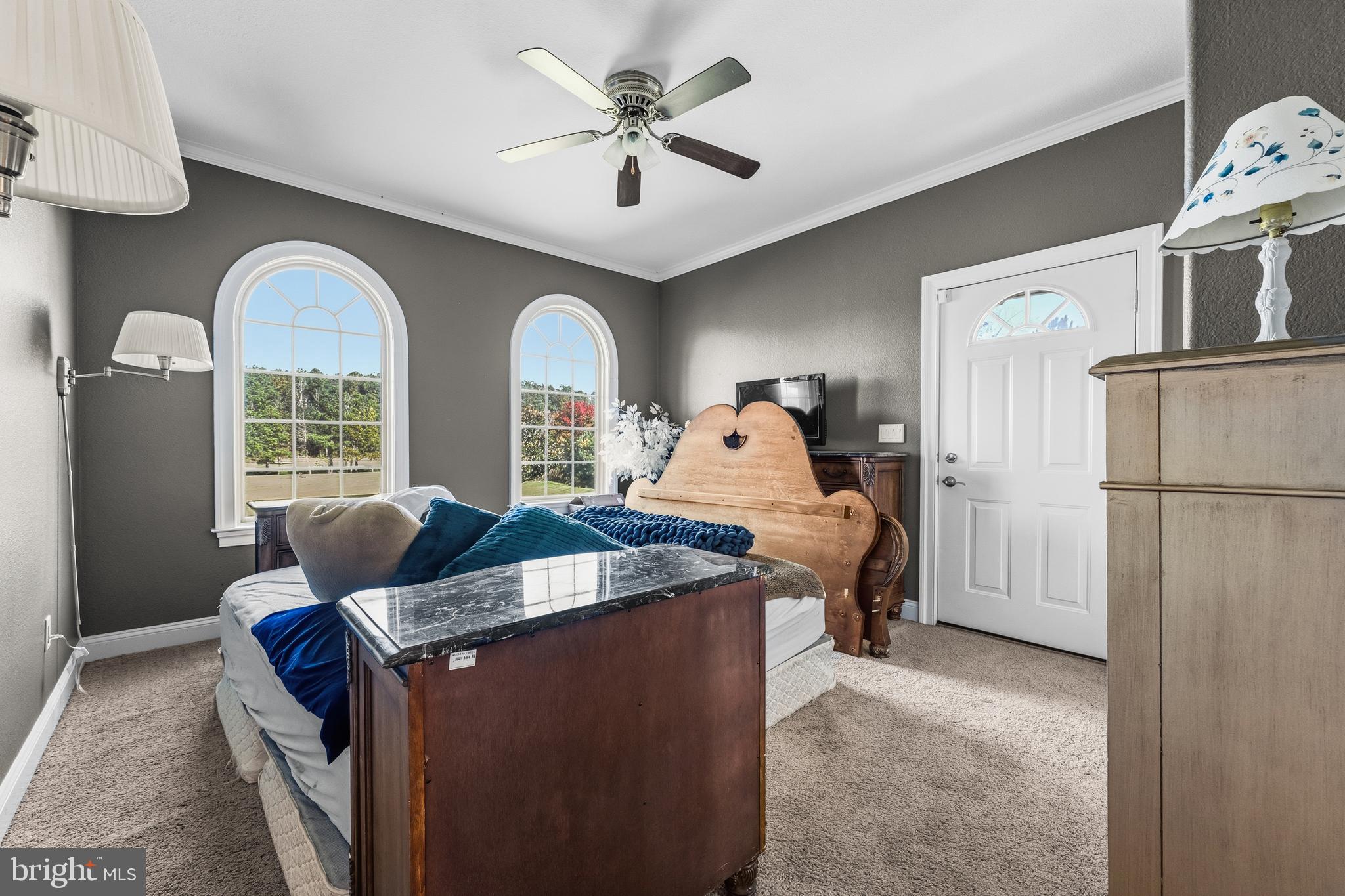 32383 Longridge Road Parsonsburg, MD 21849 - Photo 46 of 91 a living room with furniture and a chandelier