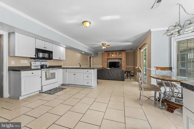 a view of a street with a building in the background