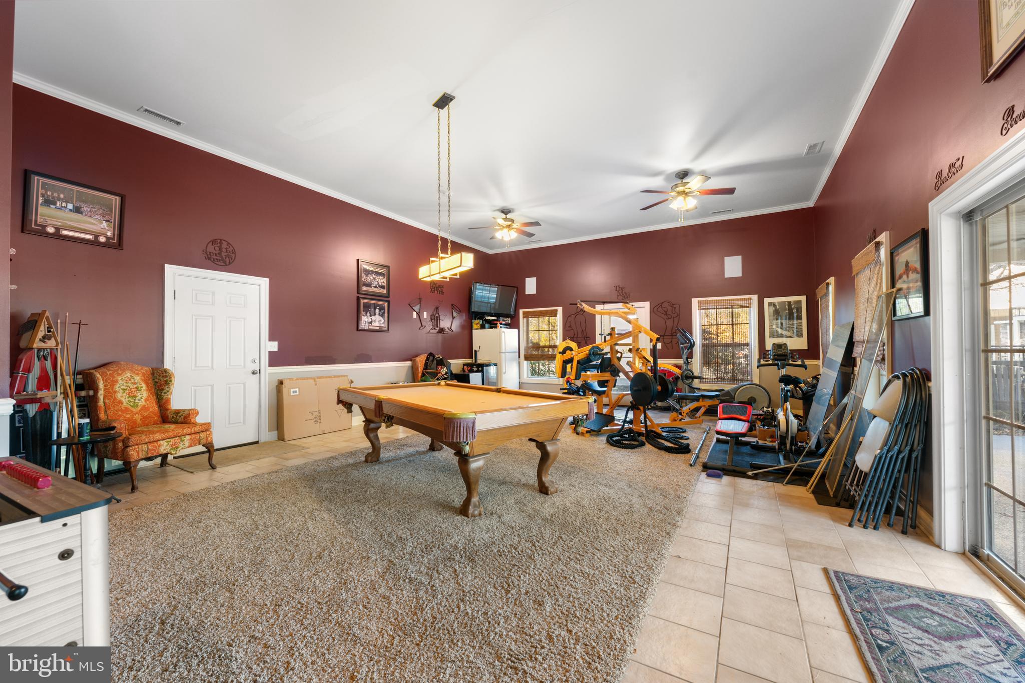 32383 Longridge Road Parsonsburg, MD 21849 - Photo 67 of 91 a living room with lots of furniture and a chandelier