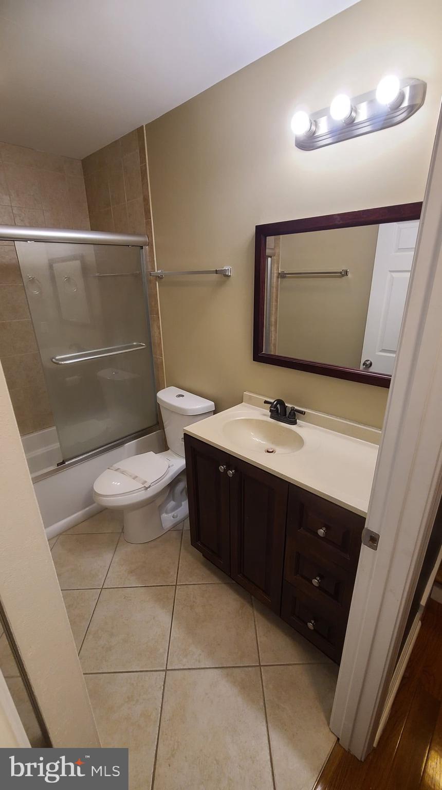 32383 Longridge Road Parsonsburg, MD 21849 - Photo 79 of 91 a bathroom with a sink a toilet and mirror