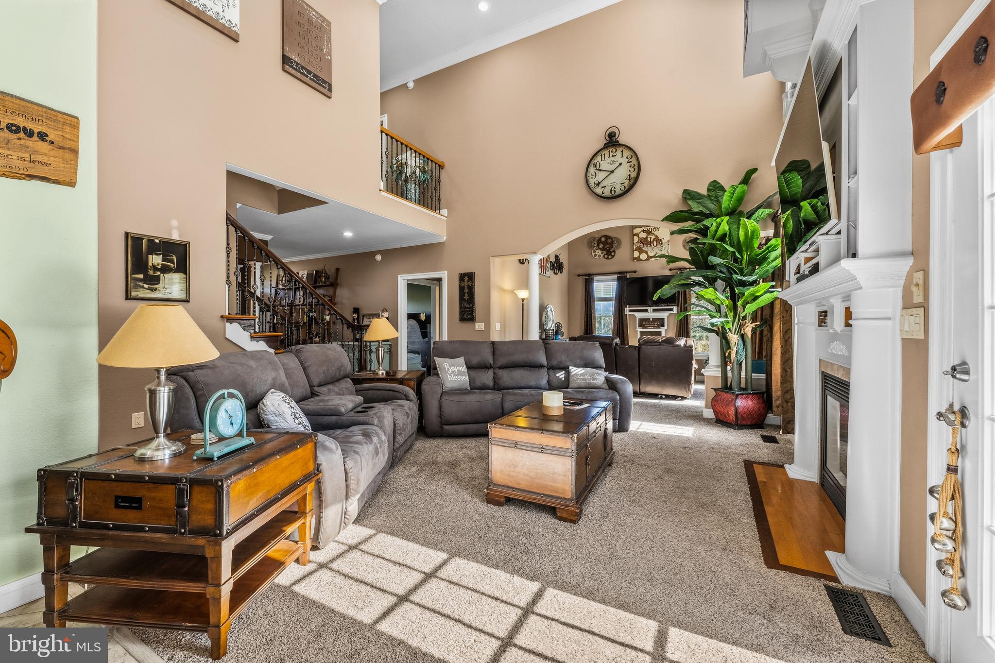 32383 Longridge Road Parsonsburg, MD 21849 - Photo 9 of 91 a living room with patio furniture and a clock