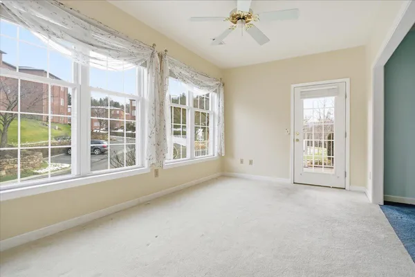 an empty room with windows