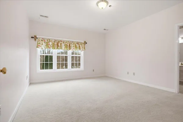 a view of an empty walk in closet