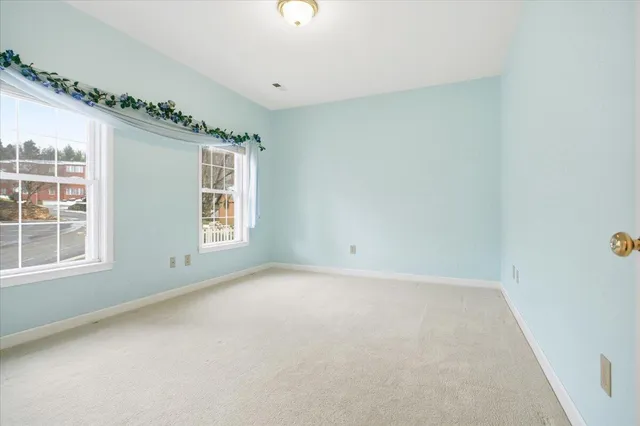 a view of parking garage with cars