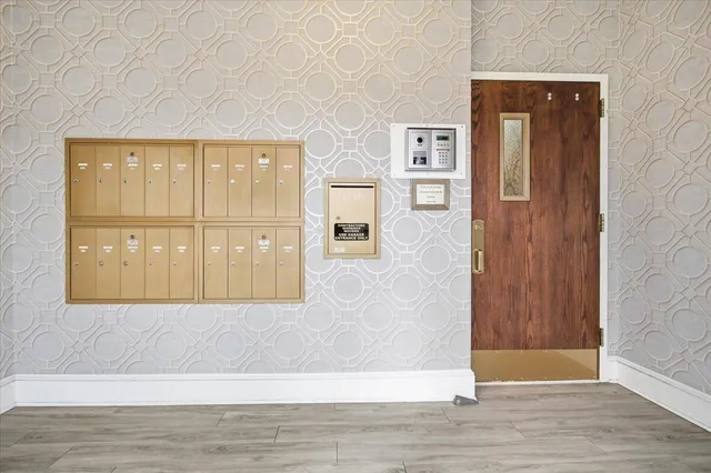 a view of a building with a yard