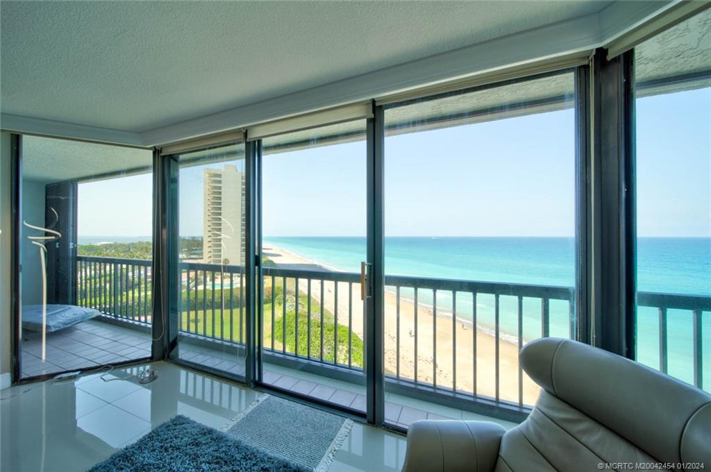 8800 South Ocean Drive, Unit 905 Jensen Beach, FL 34957 - Photo 17 of 67 a view of a porch with furniture