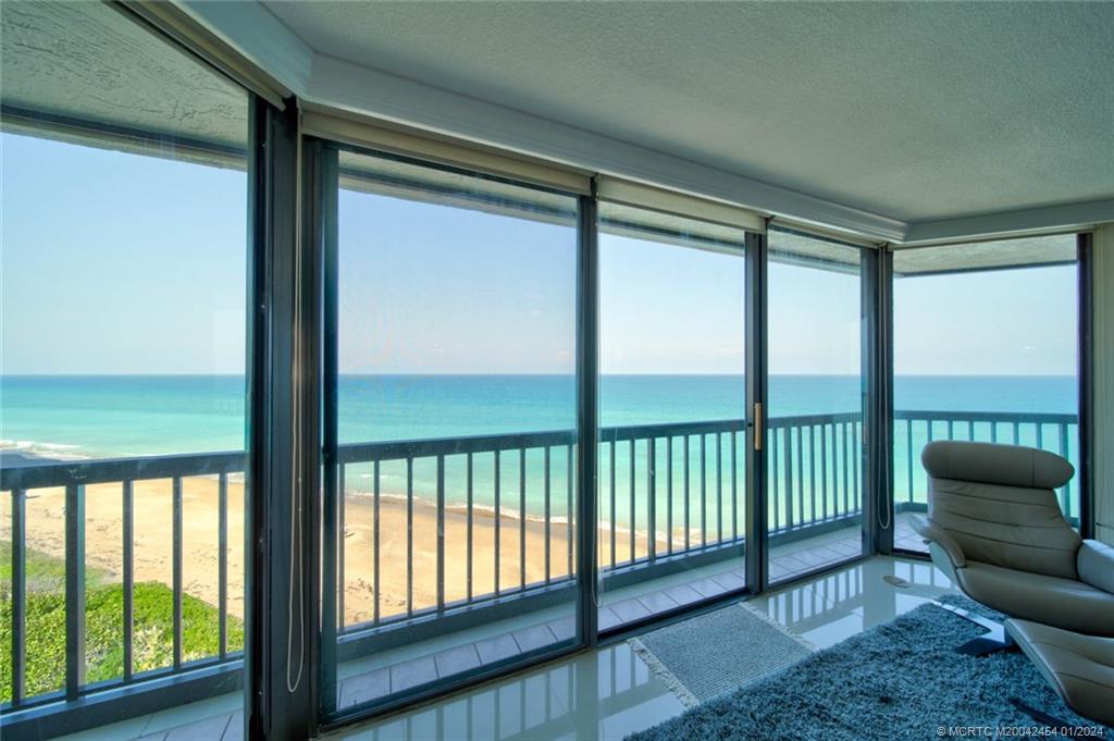 8800 South Ocean Drive, Unit 905 Jensen Beach, FL 34957 - Photo 18 of 67 a view of a porch with furniture
