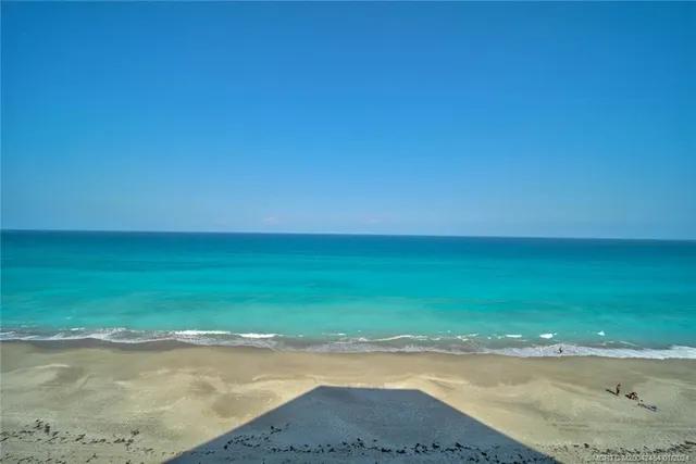 a view of an ocean from a balcony