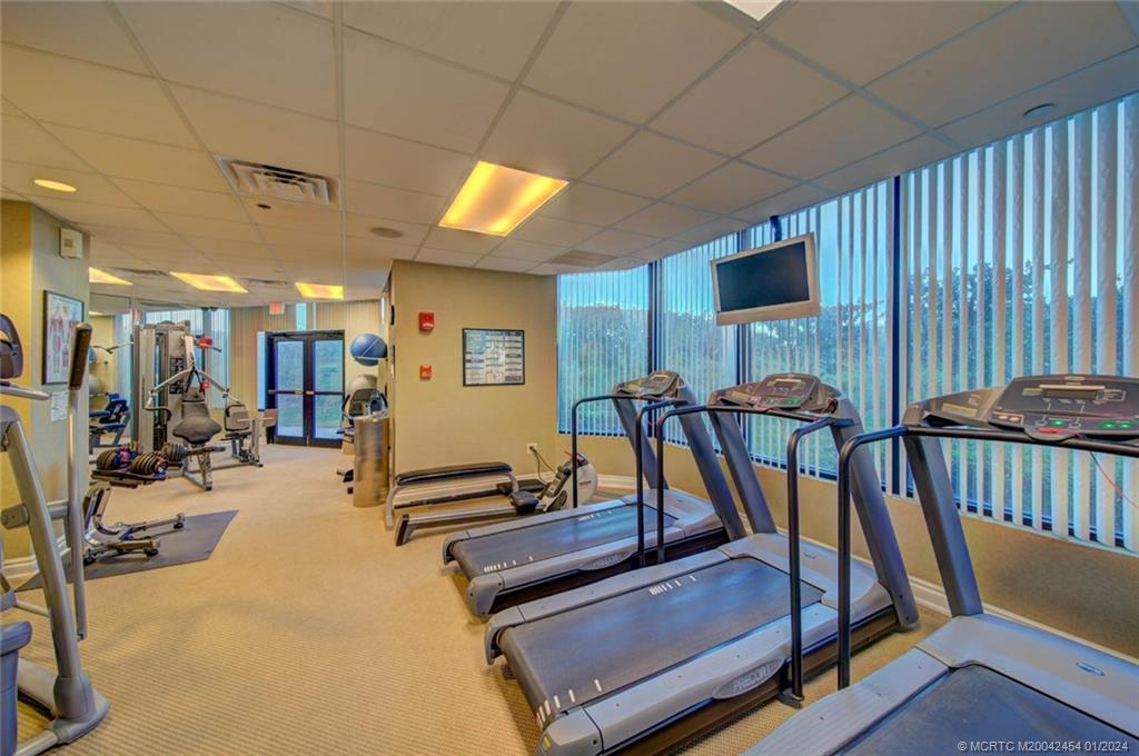 8800 South Ocean Drive, Unit 905 Jensen Beach, FL 34957 - Photo 44 of 67 a view of a room with gym equipment