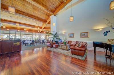 8800 South Ocean Drive, Unit 905 Jensen Beach, FL 34957 - Photo 54 of 67 a living room with furniture and a wooden floor
