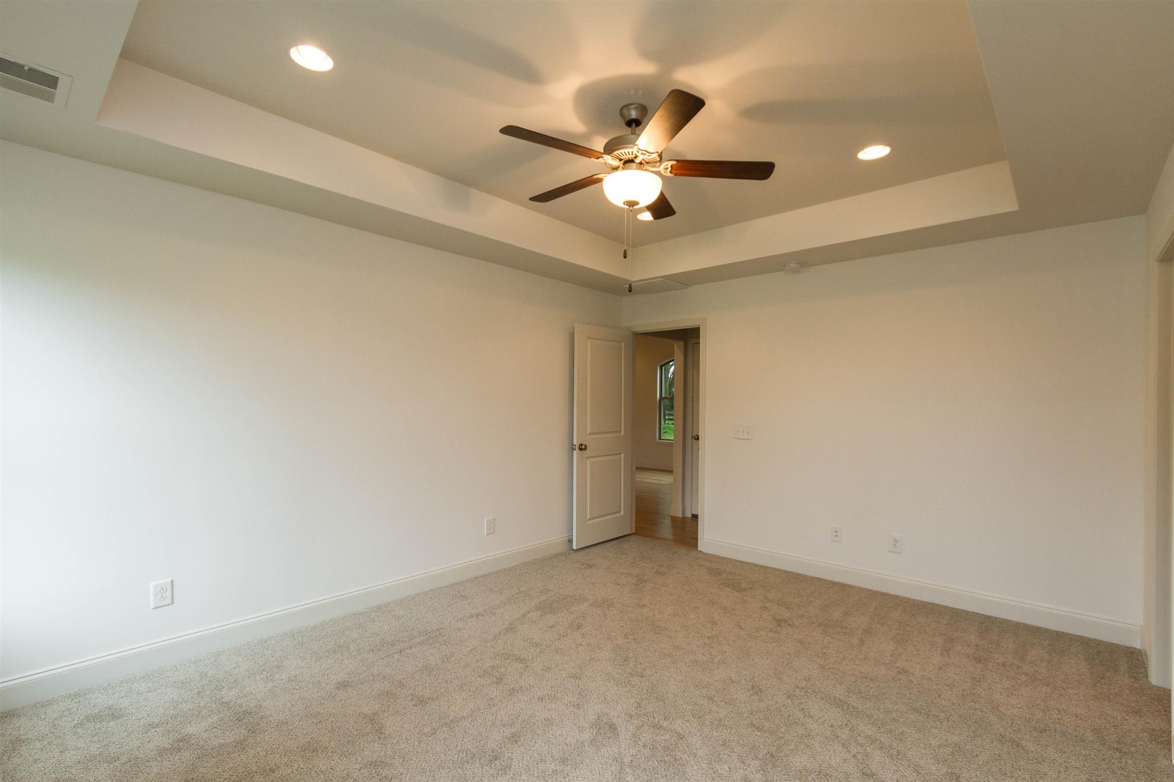 4121 Airport Road Springfield, TN 37172 - Photo 16 of 30 an empty room with a ceiling fan and a window