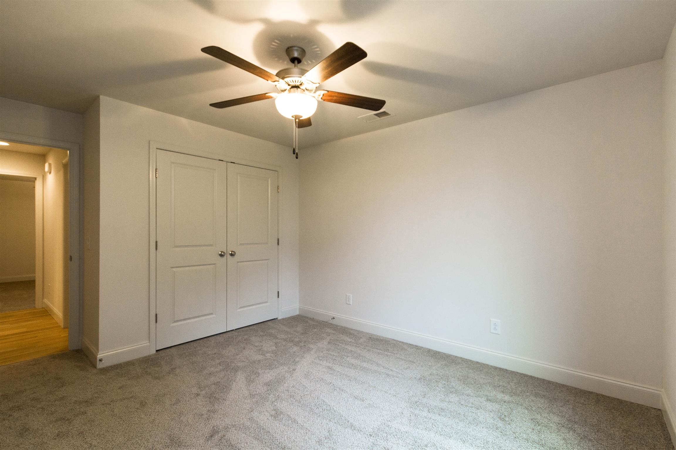 4121 Airport Road Springfield, TN 37172 - Photo 23 of 30 an empty room with a fan and a fan