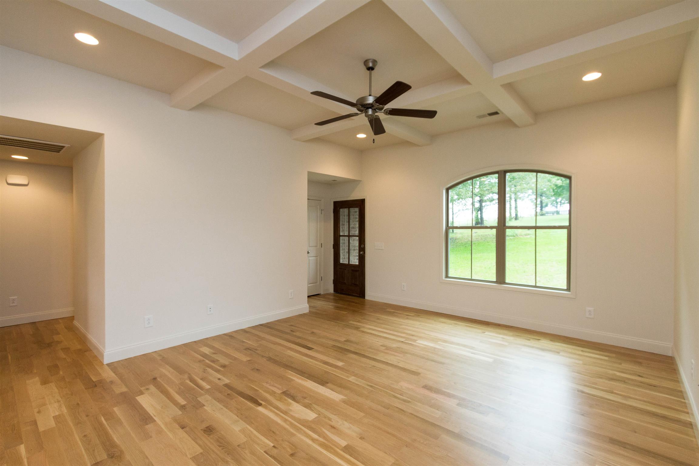4121 Airport Road Springfield, TN 37172 - Photo 4 of 30 a view of an empty room with a window and wooden floor