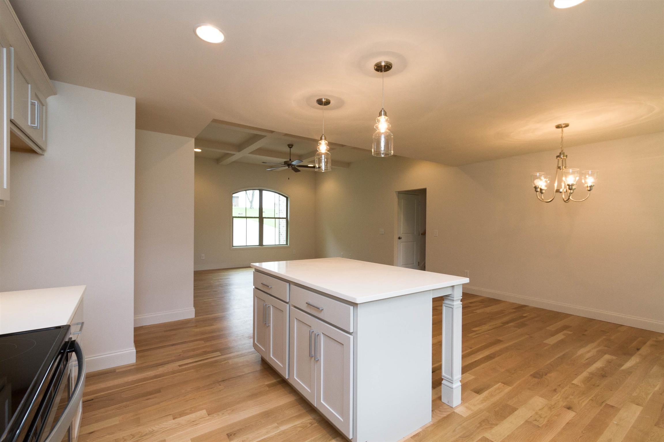 4121 Airport Road Springfield, TN 37172 - Photo 9 of 30 a kitchen that has a lot of cabinets and wooden floor