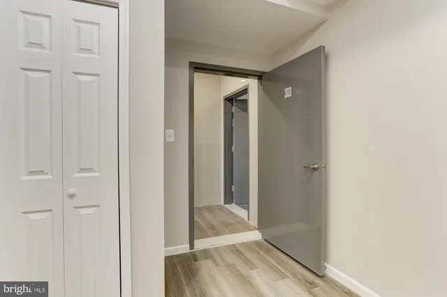 a view of a bathroom from a hallway