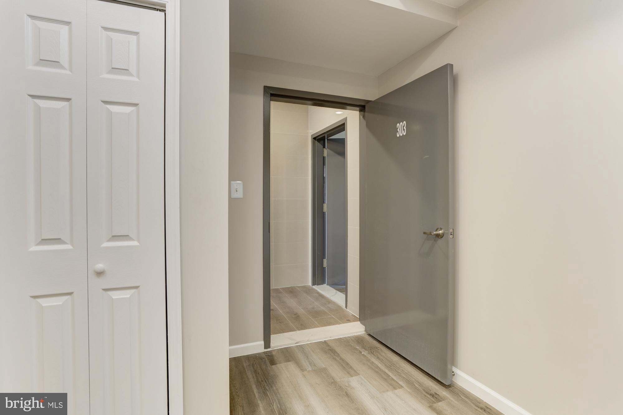 a view of a bathroom from a hallway