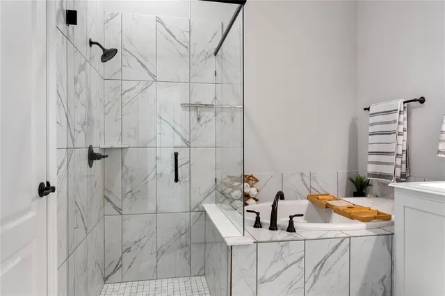 a bathroom with a sink and a shower