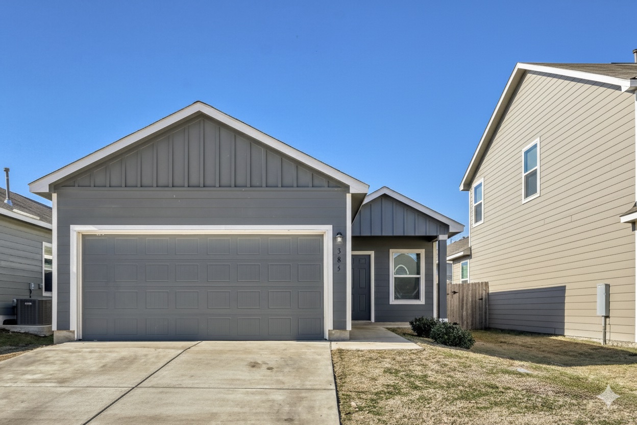 385 Geode Glen Maxwell, TX 78656 - Photo 1 of 16 View of front of home featuring board and batten siding, driveway, and an attached garage