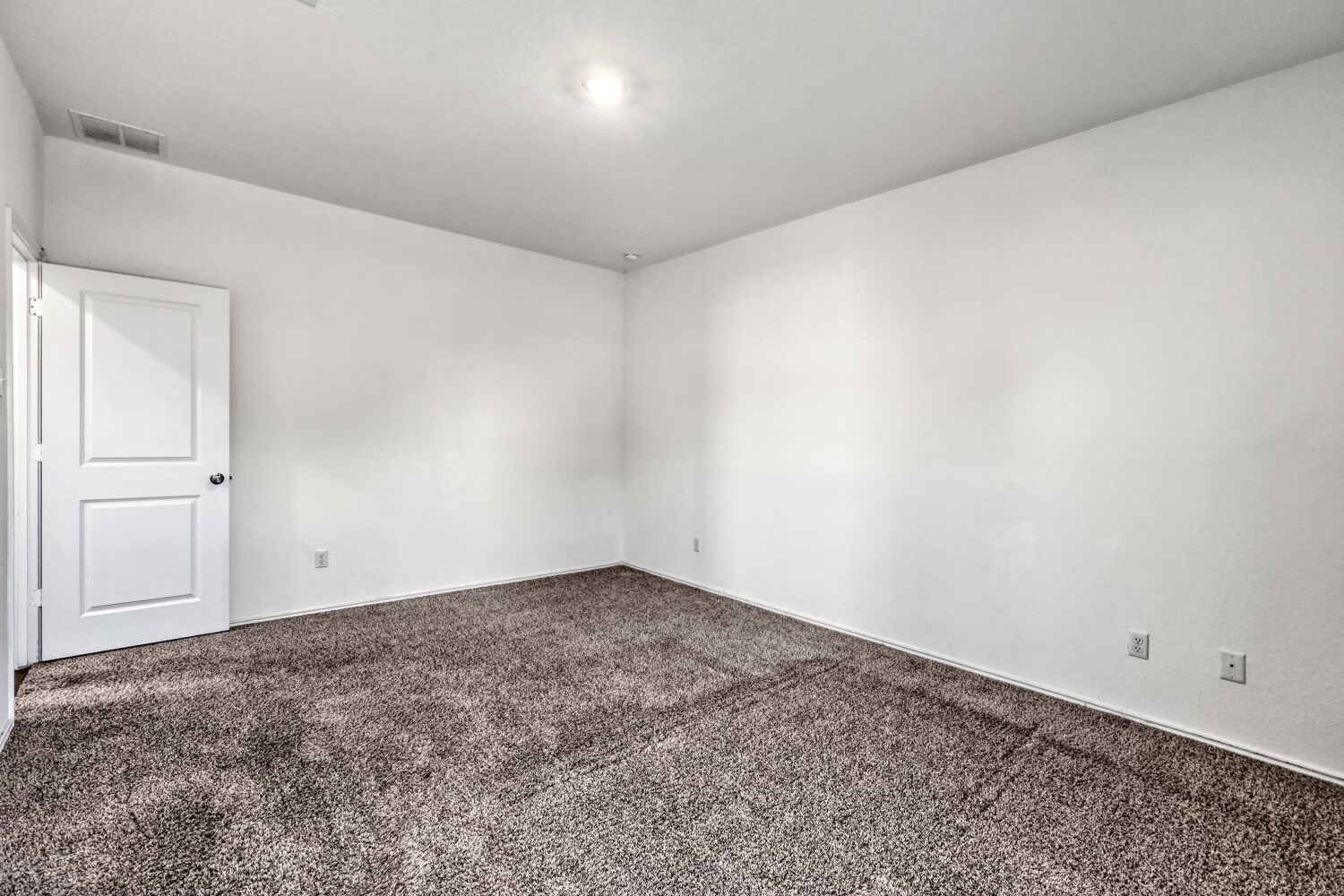 385 Geode Glen Maxwell, TX 78656 - Photo 11 of 16 Primary bedroom featuring carpet