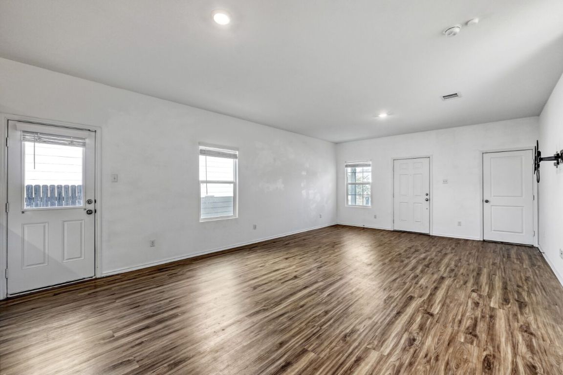 385 Geode Glen Maxwell, TX 78656 - Photo 6 of 16 Entrance living space featuring dark wood finished floors, and recessed lighting