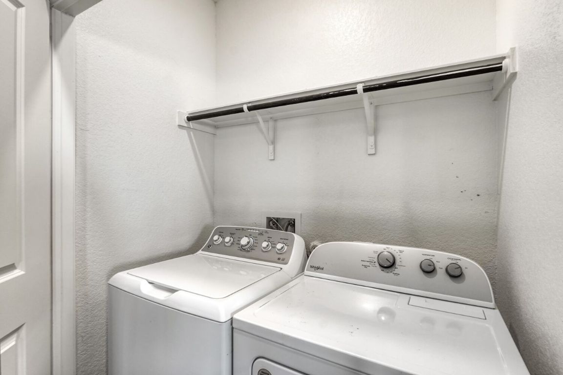 385 Geode Glen Maxwell, TX 78656 - Photo 9 of 16 Laundry area featuring a separate washer and dryer
