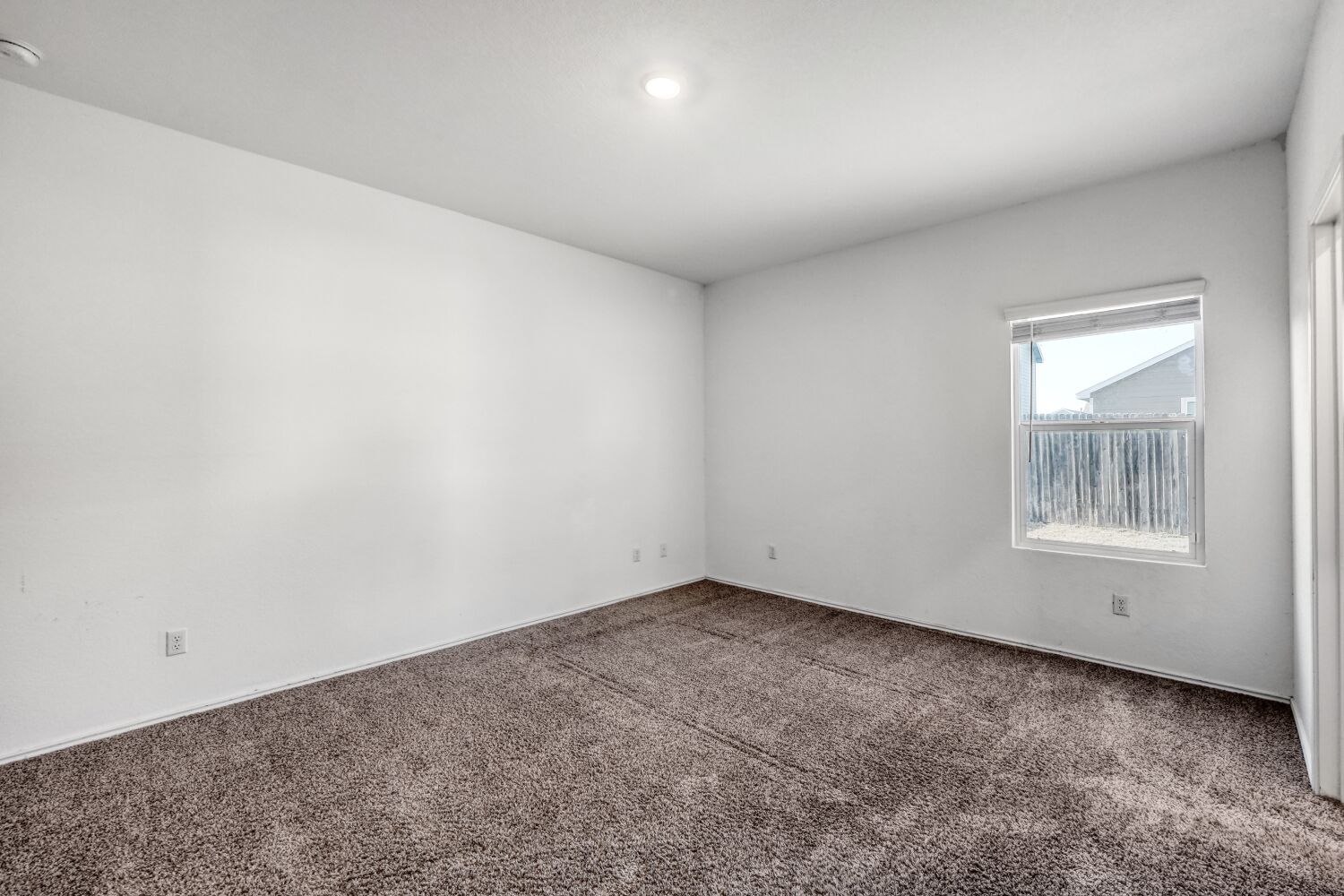 385 Geode Glen Maxwell, TX 78656 - Photo 10 of 16 Primary bedroom with carpet floor
