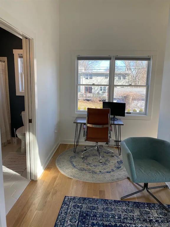 8 Clinton Avenue Old Saybrook, CT 06475 - Photo 11 of 23 a work room with a table and windows