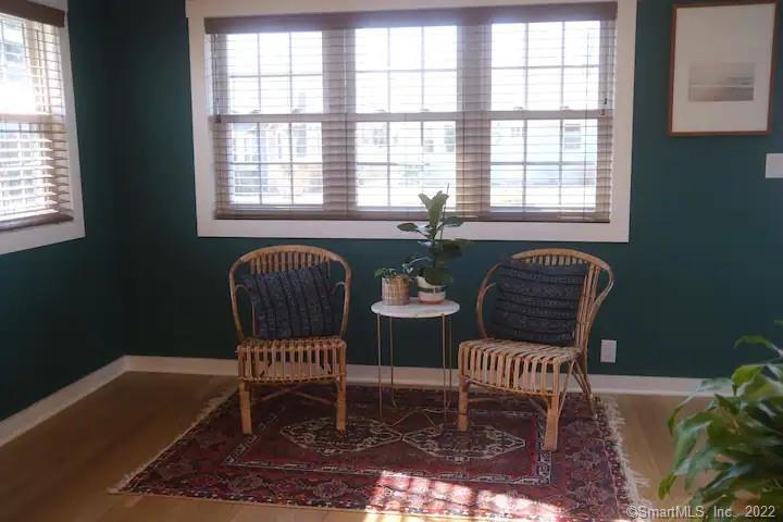 8 Clinton Avenue Old Saybrook, CT 06475 - Photo 14 of 23 a balcony with table and chairs