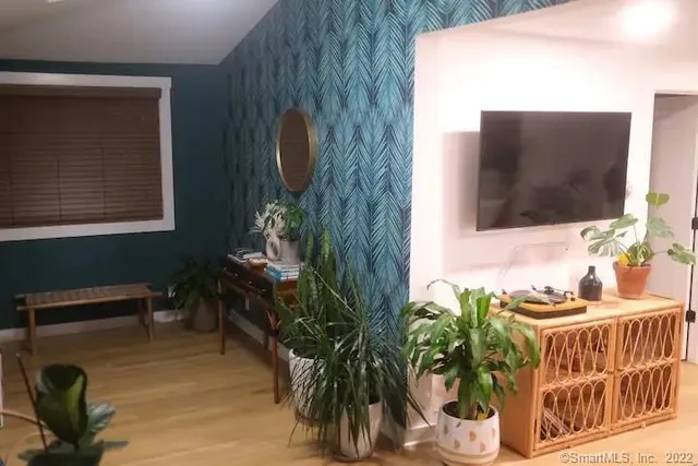 a view of an house with backyard space and garden