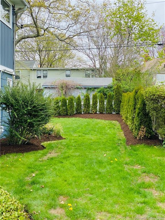 8 Clinton Avenue Old Saybrook, CT 06475 - Photo 22 of 23 a view of yard with green space