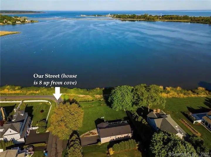 8 Clinton Avenue Old Saybrook, CT 06475 - Photo 4 of 23 an aerial view of a house with a swimming pool