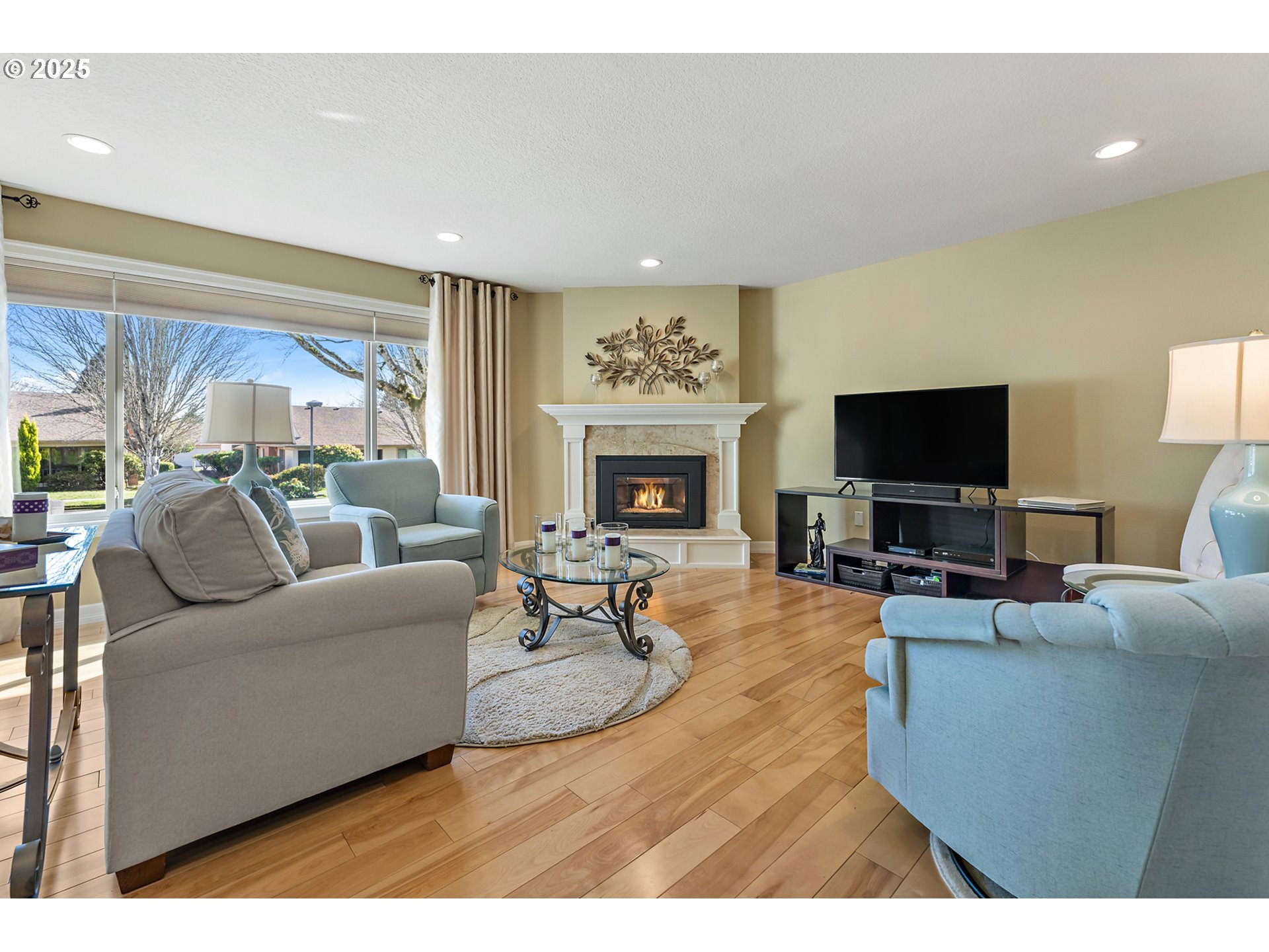 10350 Southwest Greenleaf Terrace Portland, OR 97224 - Photo 13 of 32 a living room with furniture and a flat screen tv