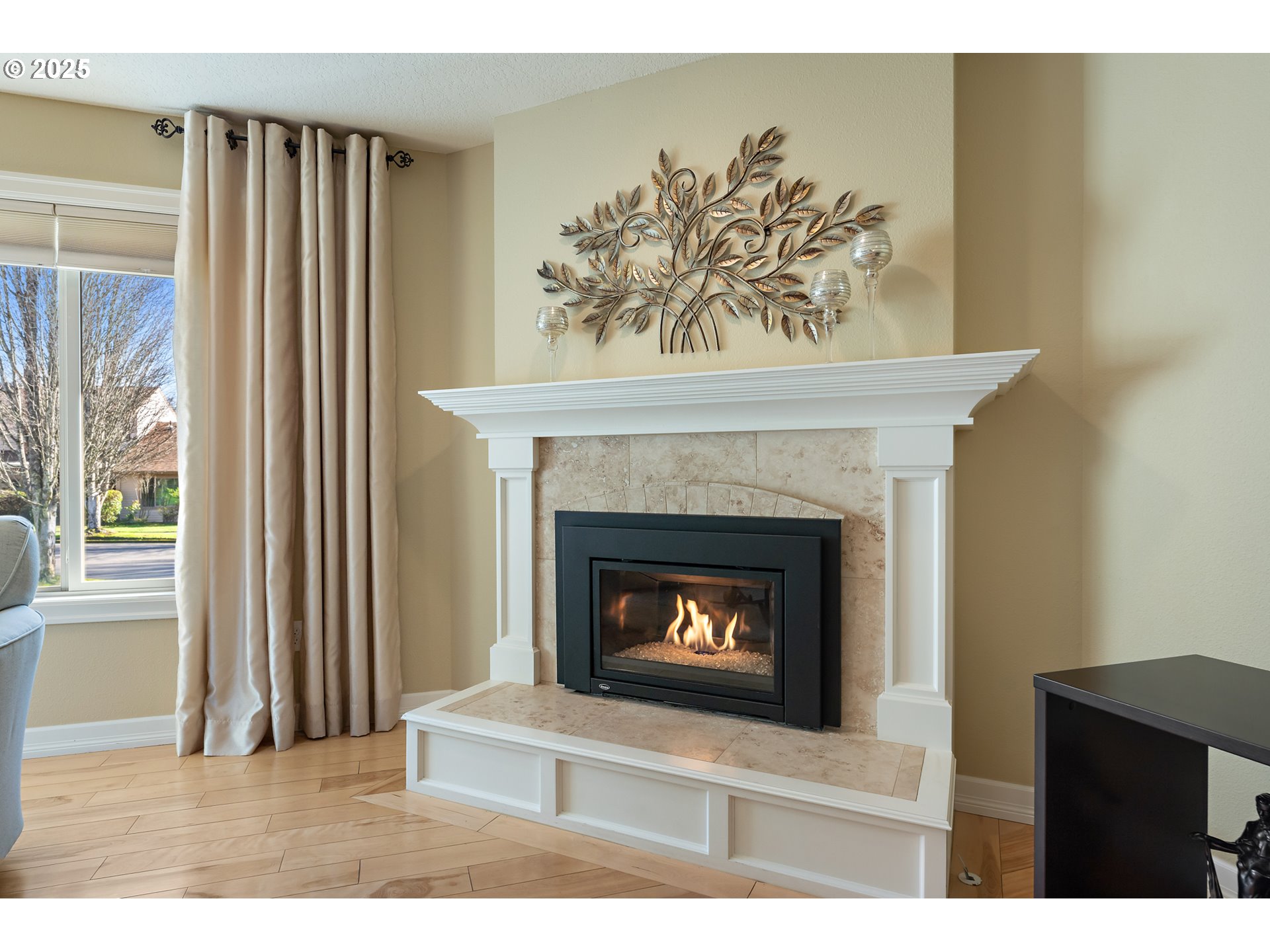 10350 Southwest Greenleaf Terrace Portland, OR 97224 - Photo 14 of 32 a living room with a fireplace and a window
