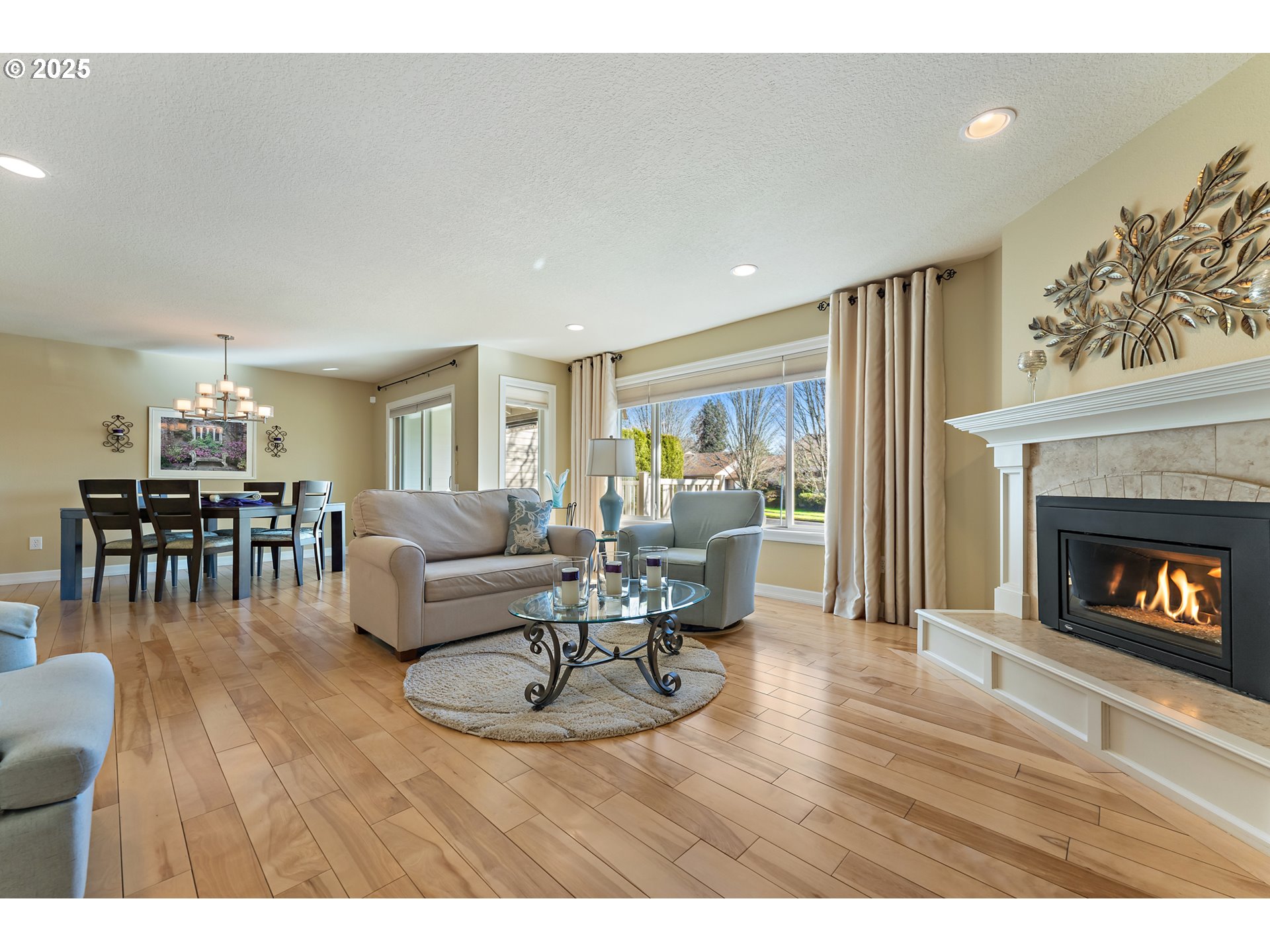 10350 Southwest Greenleaf Terrace Portland, OR 97224 - Photo 15 of 32 a living room with furniture and a fireplace