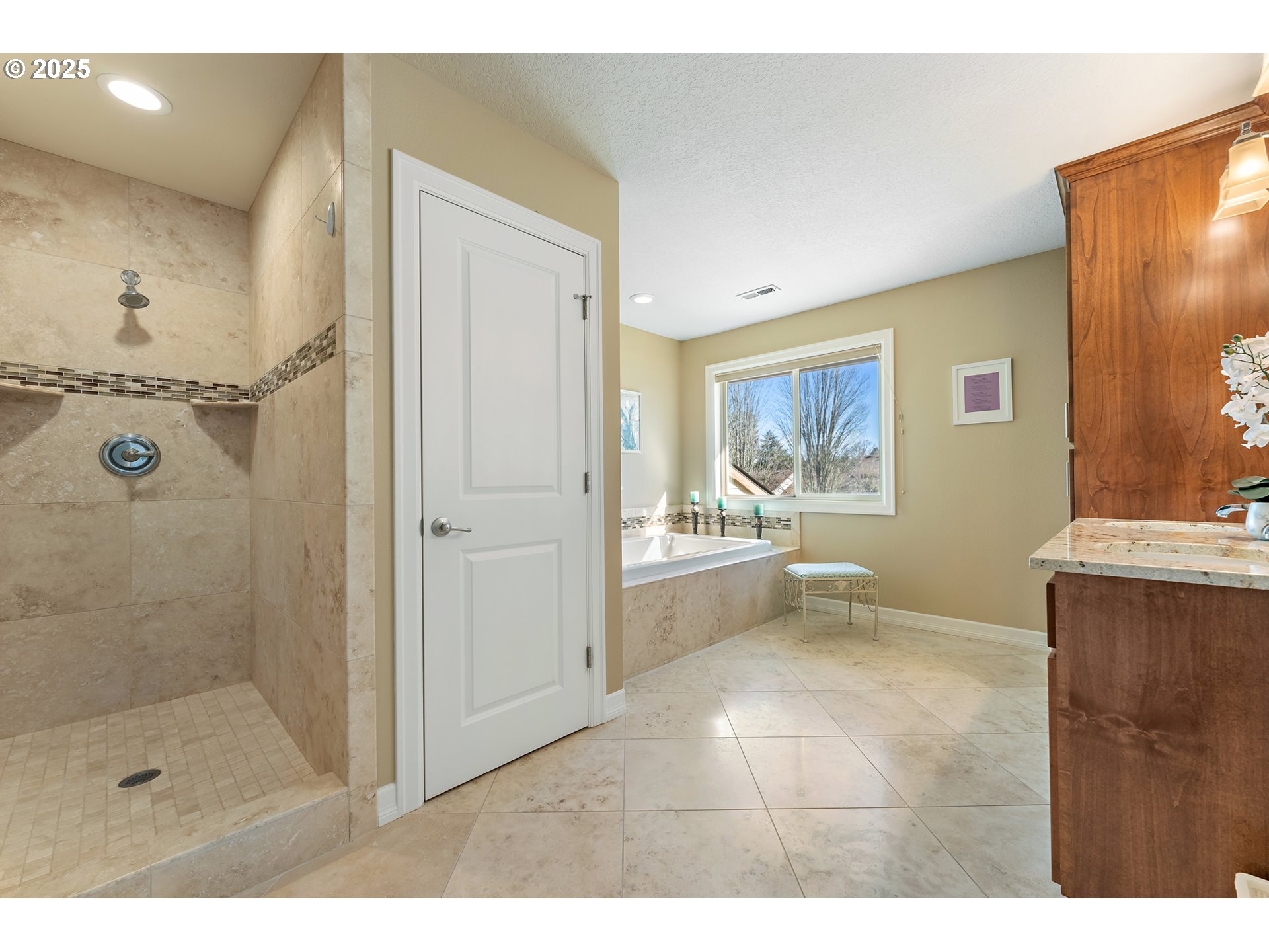 10350 Southwest Greenleaf Terrace Portland, OR 97224 - Photo 23 of 32 a bathroom with a tub shower and sink