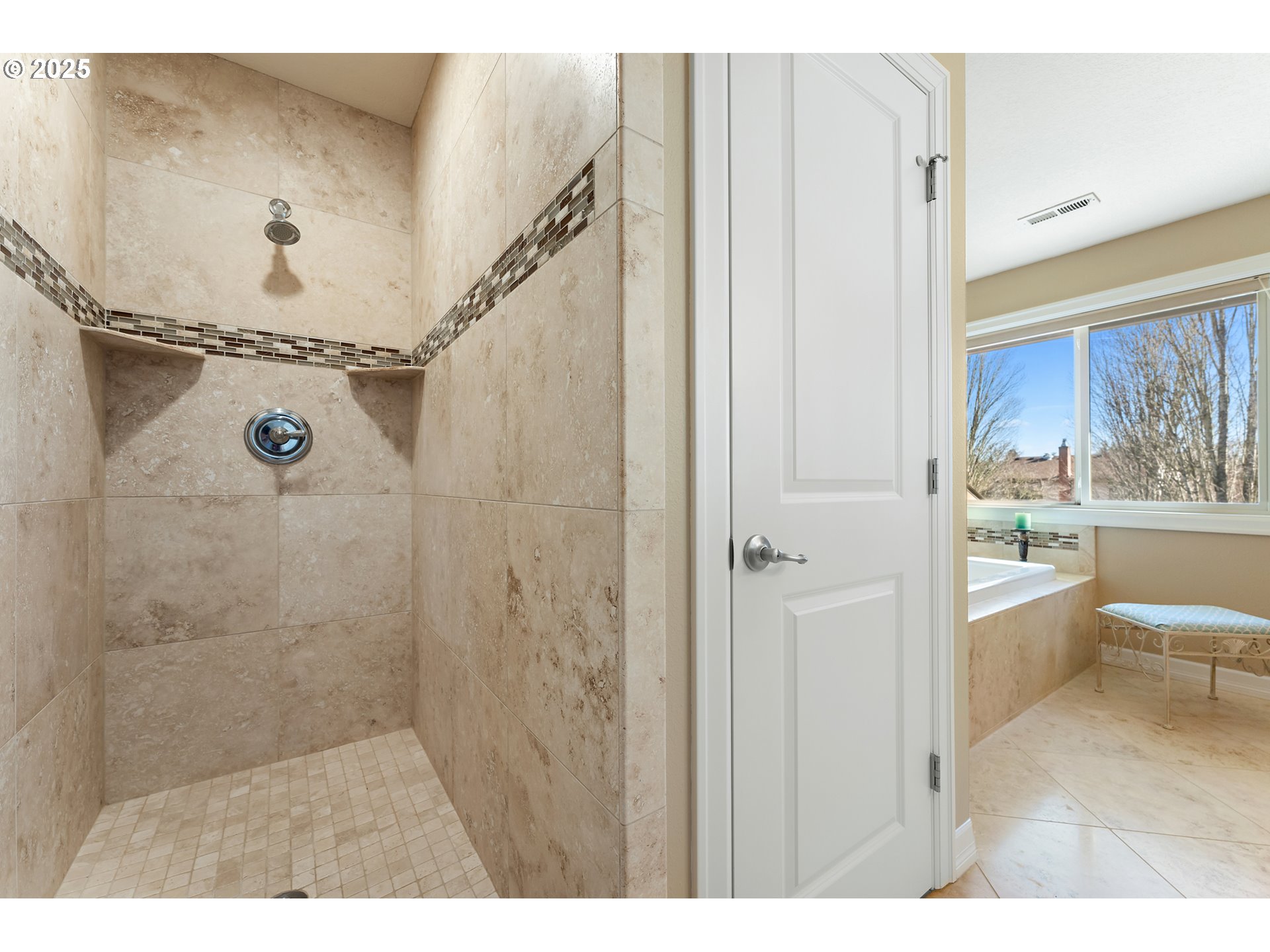 10350 Southwest Greenleaf Terrace Portland, OR 97224 - Photo 26 of 32 a bathroom with a bathtub and a shower