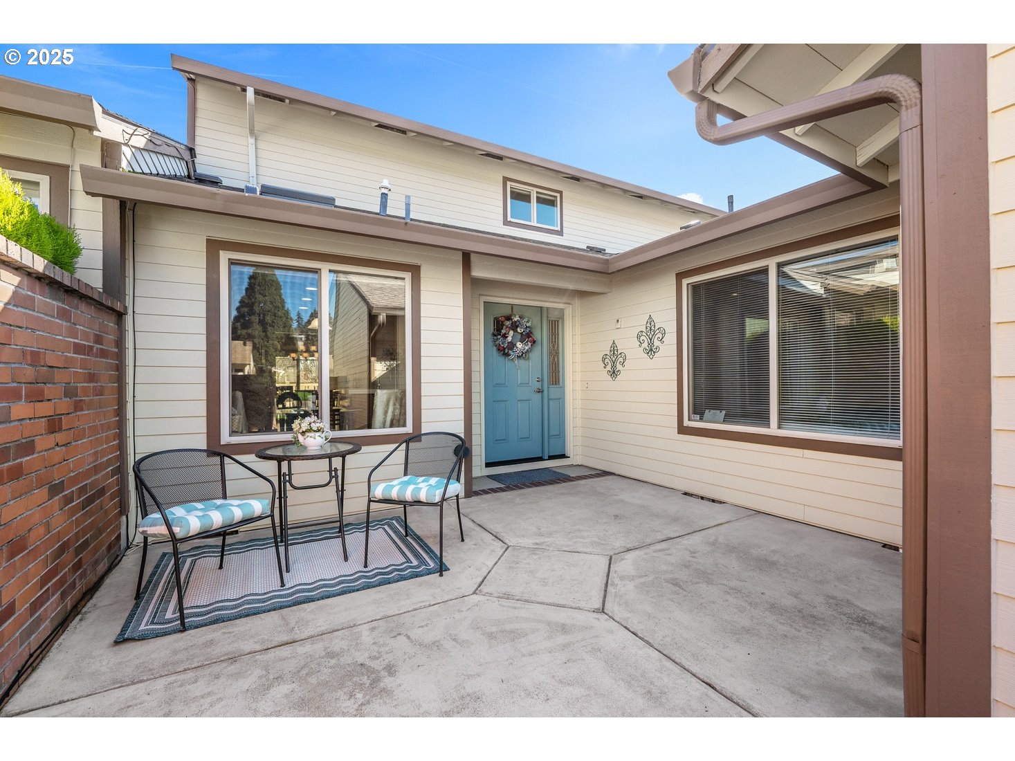 10350 Southwest Greenleaf Terrace Portland, OR 97224 - Photo 3 of 32 a view of a building with chair and tables