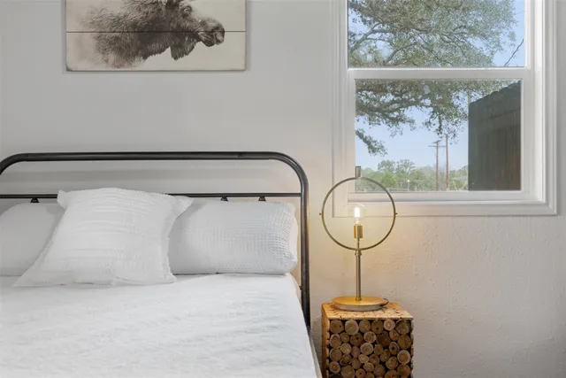 a bathroom with a bathtub and a sink