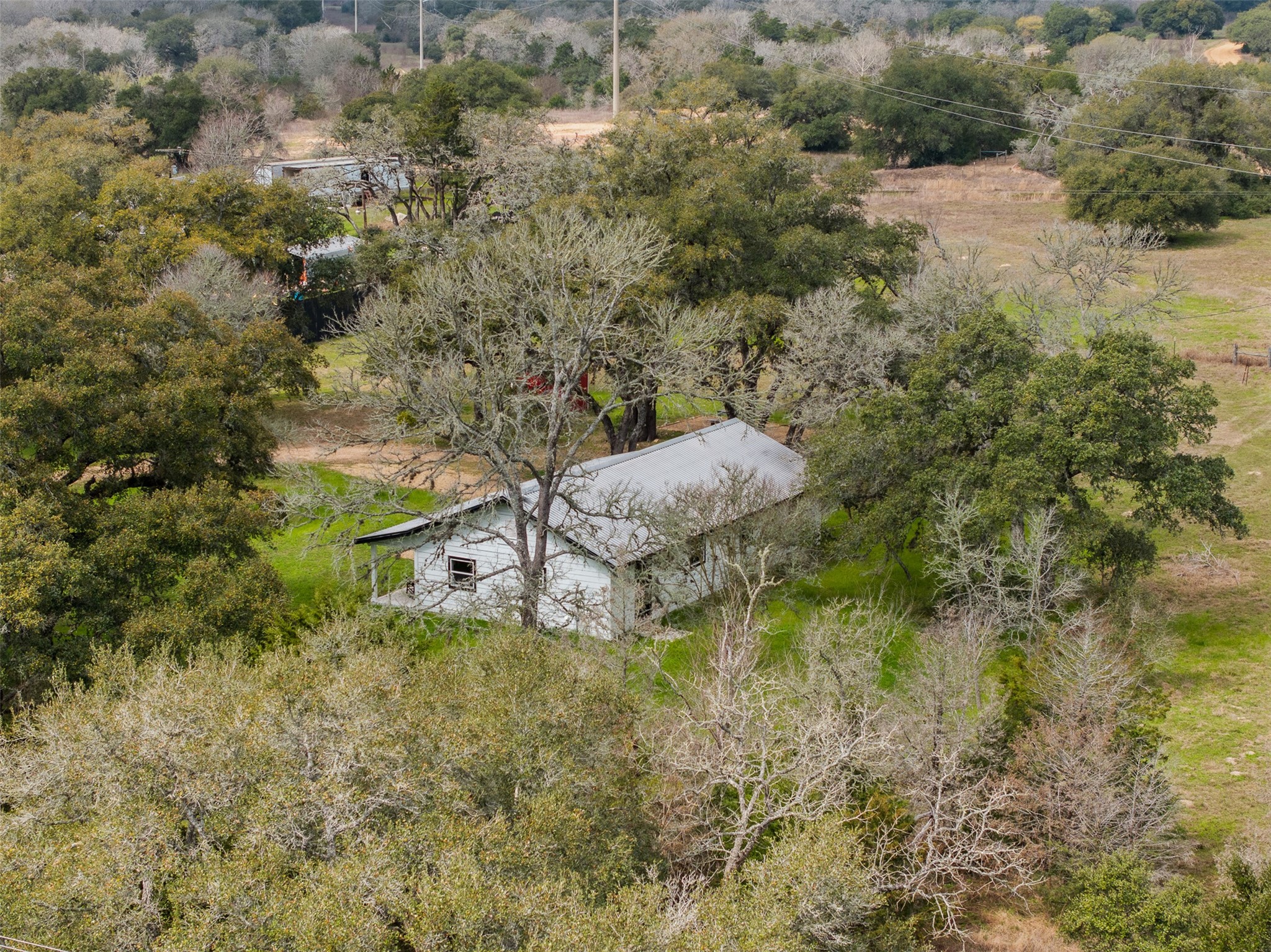 2407 East State Highway 159 Fayetteville, TX 78940 - Photo 26 of 35 a backyard of a house with lots of green space