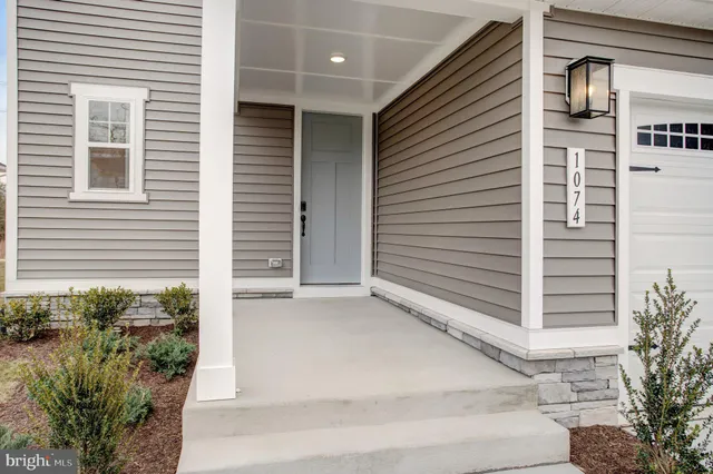 a view of a house with a garage
